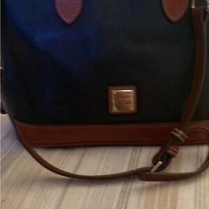 Dooney & Bourke Black and Brown Leather mid size hand bag